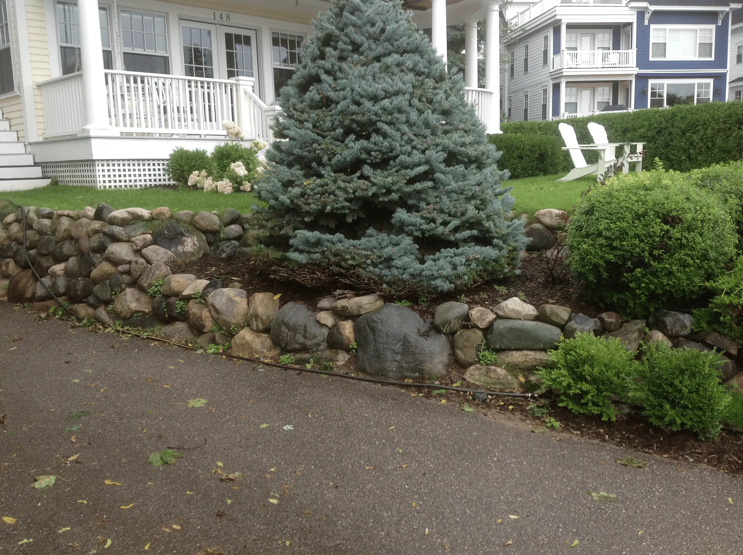 Before: sloped area without clearly defined stone steps.