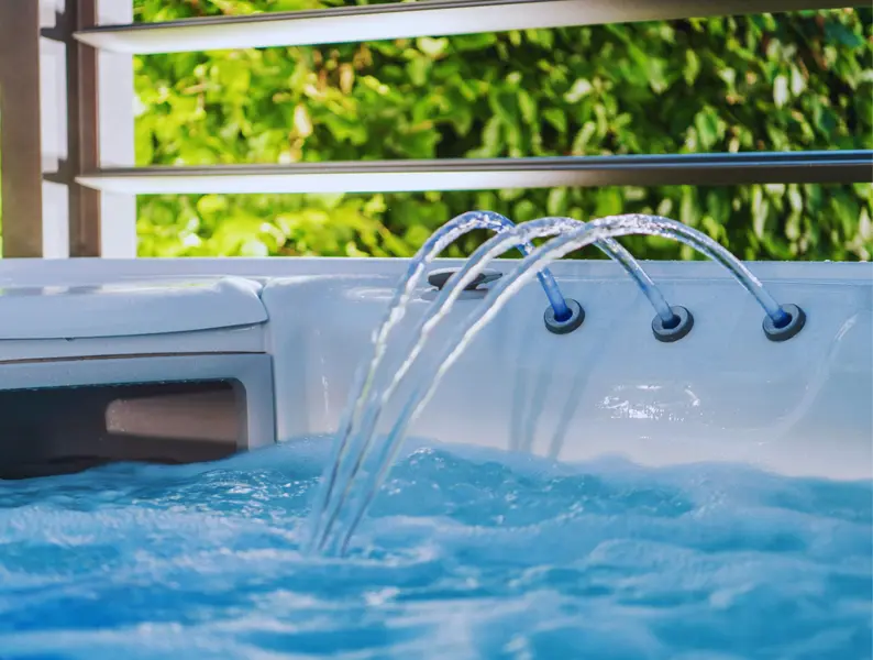Outdoor hot tub on a deck with a view